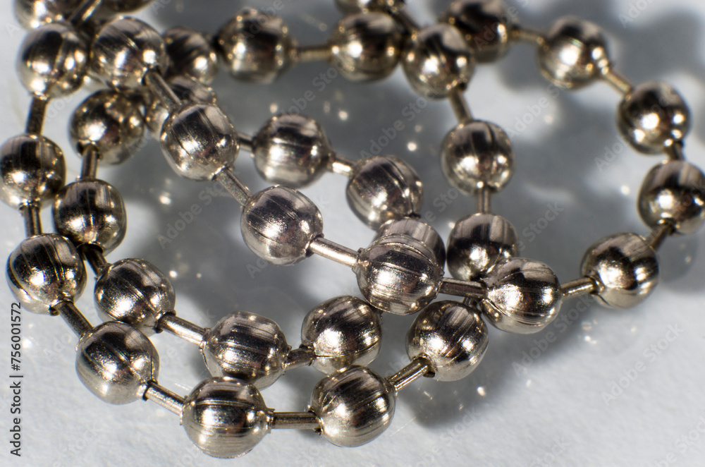 Silver chain close-up on white background Silver chain close-up on white background
