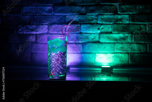 colorful cocktail in glass on dark background or Glasses of cocktails on bar background.Party club entertainment.