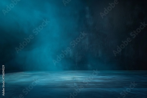 Abstract background with blank dark wall and smoky concrete floor illuminated by blue color
