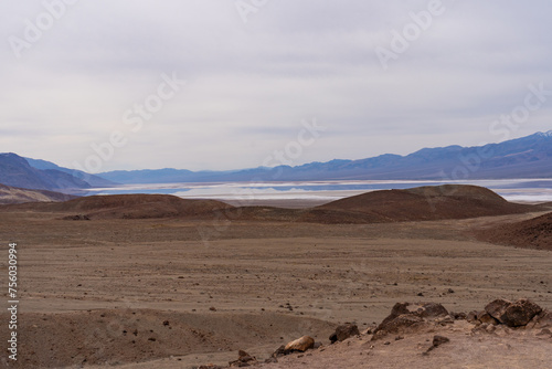 Lake Manly, the pluvial lake in Death Valley National Park at, Badwater Basin. Large rainfalls in 2024 create large reflecting lake. 