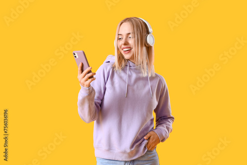 Beautiful young woman in st...