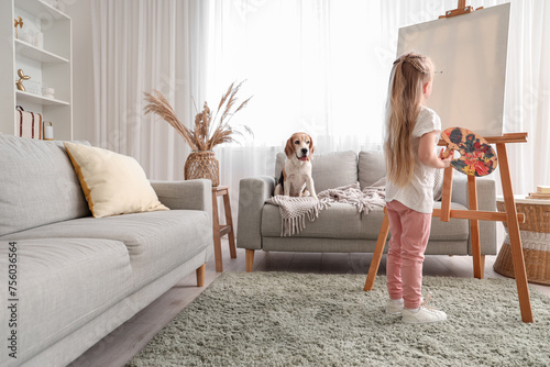 Little girl with long blond...