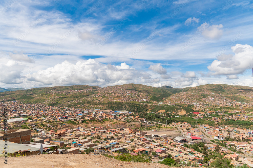 houses built on a hill, hillside settlements, urban development in latin america
