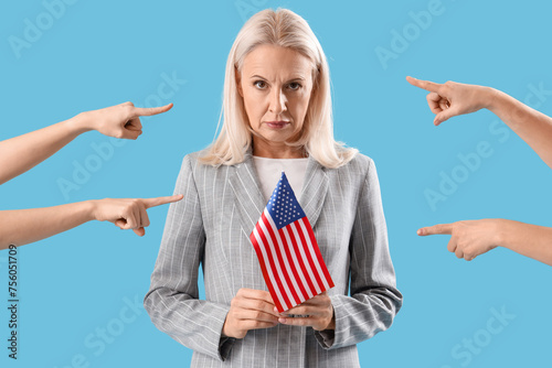 People pointing at mature w...
