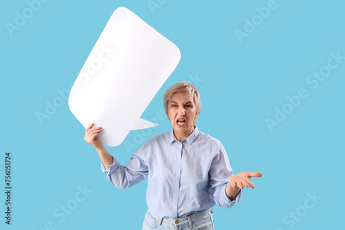 Angry mature woman with bla...