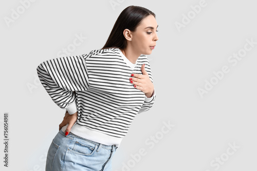 Young woman suffering from ...