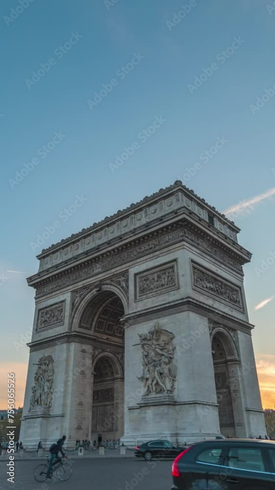 Paris France time lapse day to night sunset city skyline at Arc de Triomphe and Champs Elysees street (Vertical)