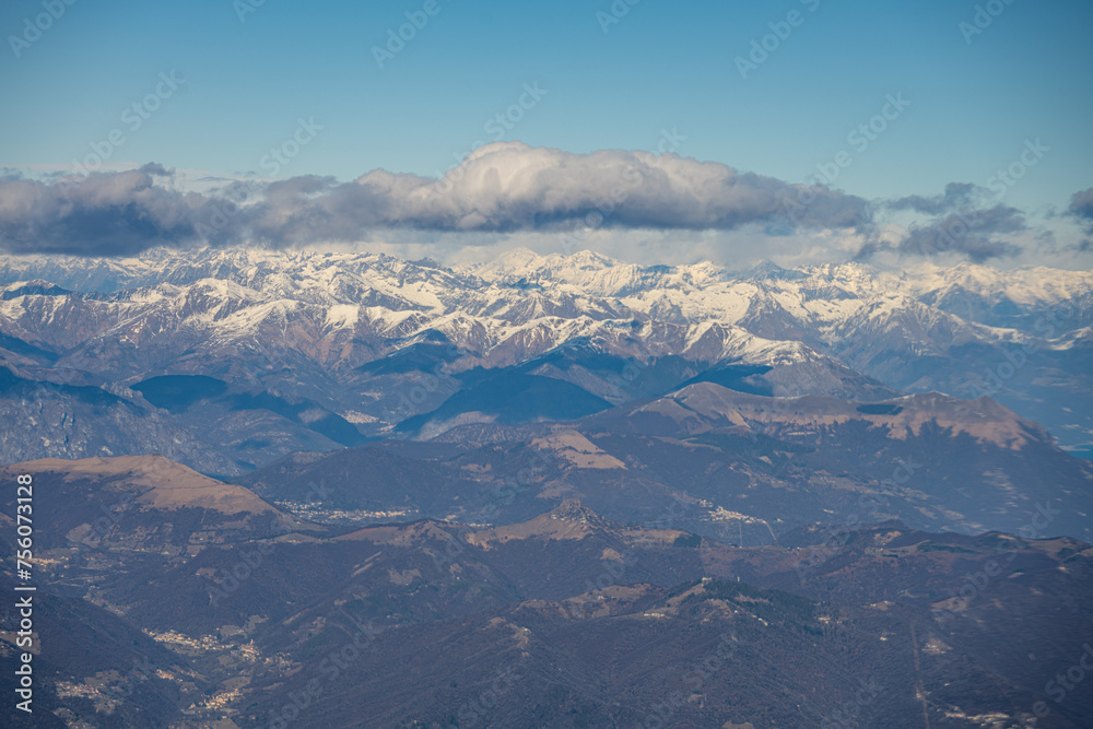 Fototapeta premium Majestic Alpine Peaks Viewed from Above on Flight from Milan