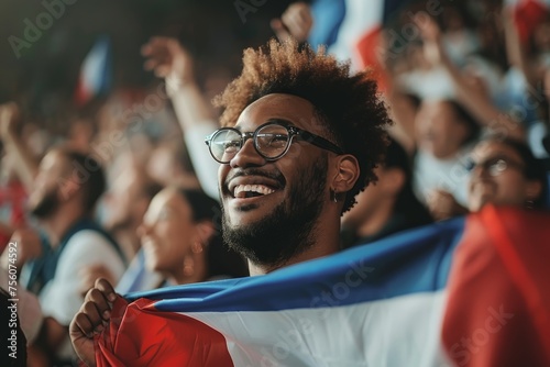 Happy fan with French flag at stadium, cheerful