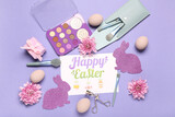 Composition with greeting card, makeup accessories, eyeshadows and Easter decor on lilac background
