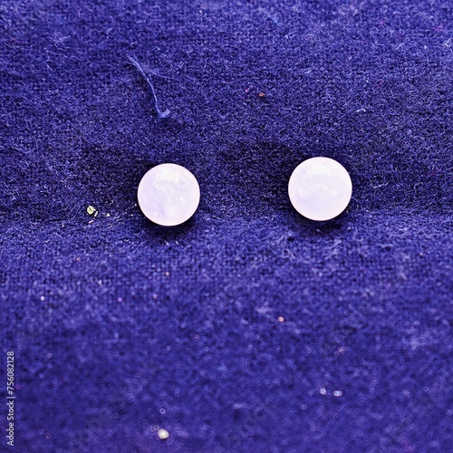 2 rose quartz gemstones or healing crystals in bead format. (ID: 756082128)