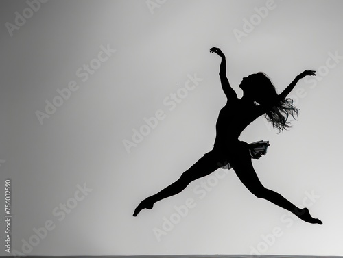 dancer silhouette against a white background