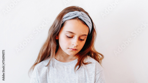 Sad child unhappy kid depressed lonely little girl