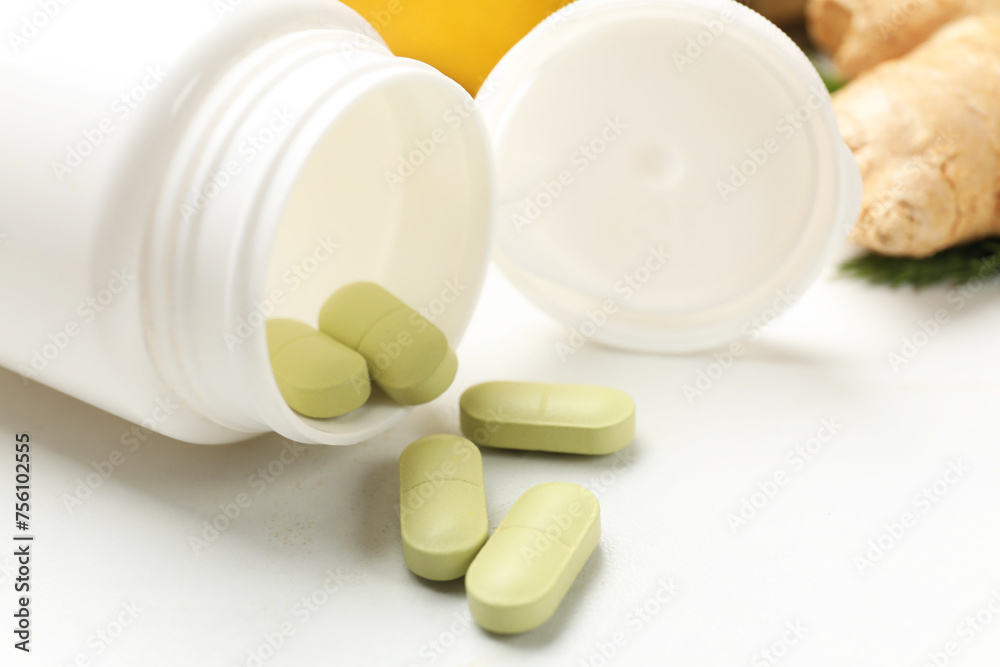 Dietary supplements in plastic bottle on white table, closeup Dietary supplements in plastic bottle on white table, closeup