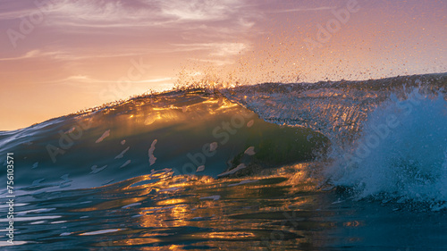 Crashing Wave backlit by sunset