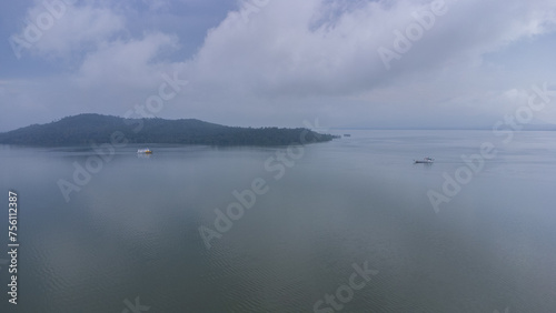 The ferry was on its way to carry passengers and freight to the port and was seen passing another ferry photo