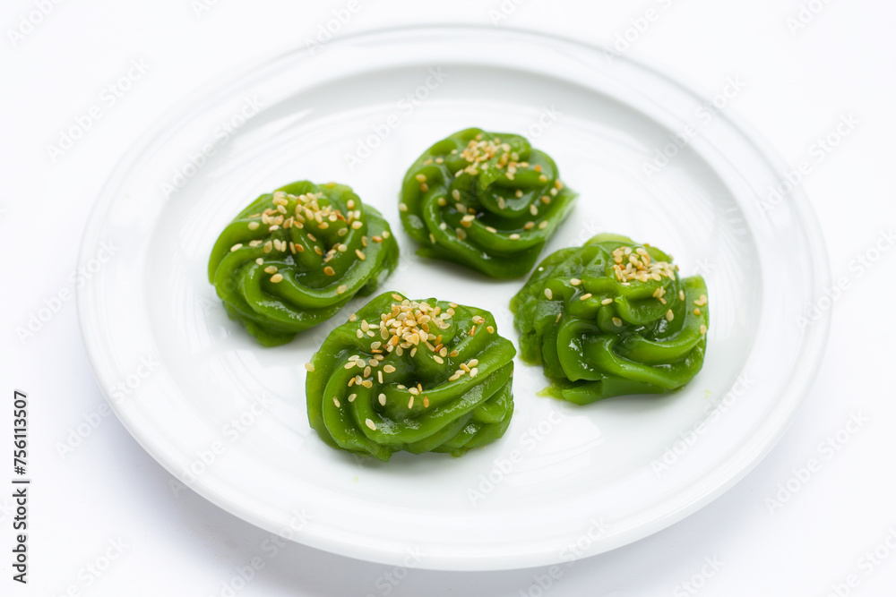 Sweet pandan pudding with white sesame seeds Sweet pandan pudding with white sesame seeds
