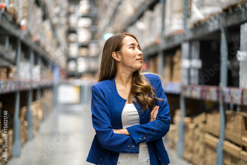Portrait asian engineer woman shipping order check goods supplies export, import, goods, factory, warehouse, international trade, transportation ,cargo ship, logistic, distribution.business industry