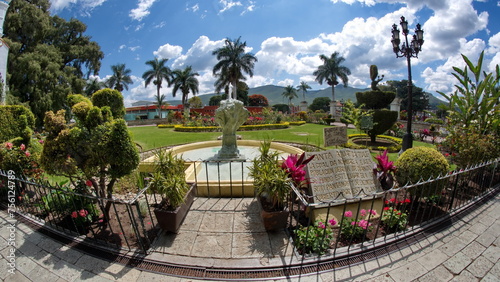 Fountain in the garden in front of the Tule Tree in Santa Maria del Tule, Oaxaca, Mexico photo