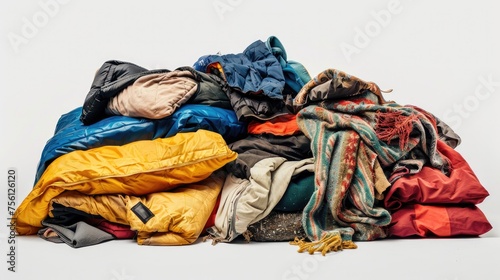 pile of garbage with clothes. white background.