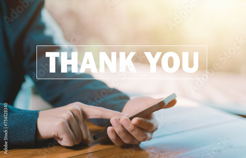 businessman using a smartphone send message thank you, presentation from technology digital. concept of thank you business, appreciation and gratitude, congratulations