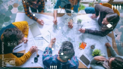 Multi-disciplinary team engaging with digital construction interface, innovation at work.