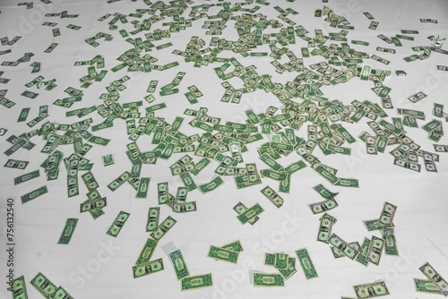 floor full of dollars bills