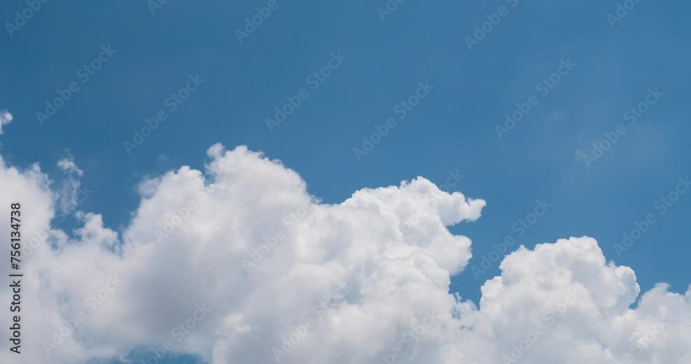 Timelapse Blue sky fluffy white clouds on summer season bright clear skyline with beautiful cloudscape. Timelapse Panorama blue sky clouds heaven on daylight with copy space. Cloudscape sunny day. Timelapse Blue sky fluffy white clouds on summer season bright clear skyline with beautiful cloudscape. Timelapse Panorama blue sky clouds heaven on daylight with copy space. Cloudscape sunny day.