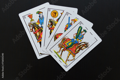 a Spanish deck of cards showing the horses
