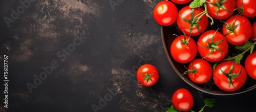 A bowl of plum tomatoes, a delicious and nutritious ingredient for a variety of recipes. These natural foods are packed with vitamins and antioxidants