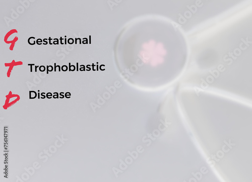 GTD or Gestational Trophoblastic Disease, medical term at stethoscope background. photo