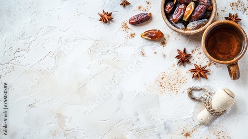 Dates and Cinnamon in Bowl with Cup of Tea on Light Grey Background