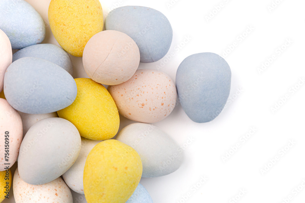 Mini Multicolored Candy Coated Chocolate Easter Eggs Isolated on a White Background Mini Multicolored Candy Coated Chocolate Easter Eggs Isolated on a White Background