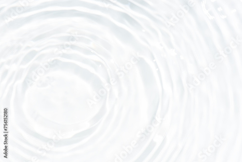 White water surface texture with ripples, splashes, and bubbles. Abstract summer banner background Water waves in sunlight with copy space cosmetic moisturizer micellar toner emulsion. White water.