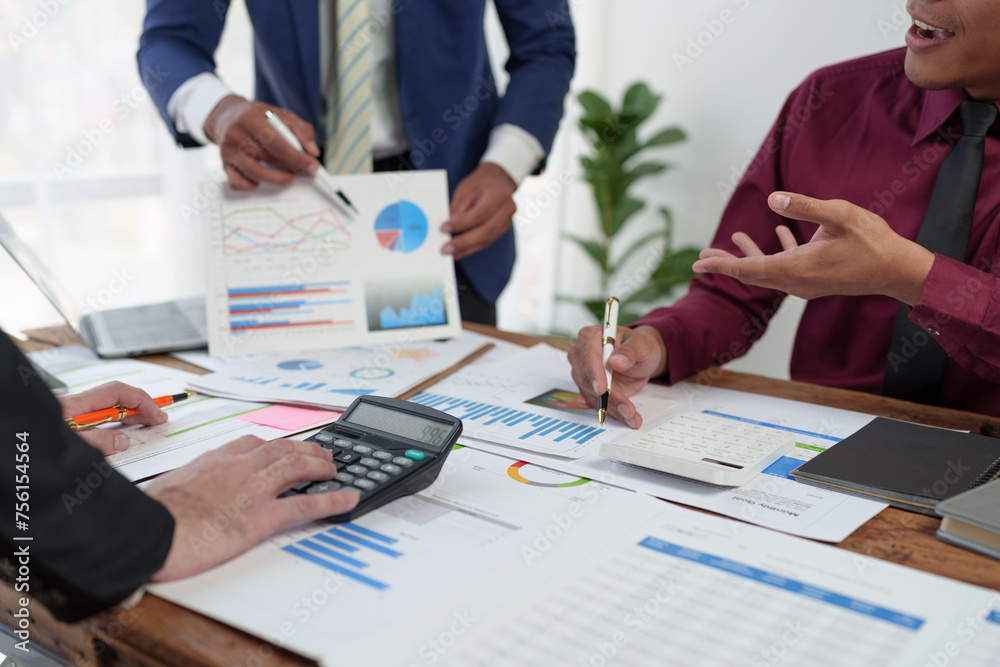 Business team presentation meeting Asian Men Finance Executive discusses meetings to plan work, investment projects, and trading strategy for trading partners. Finance and Accounting