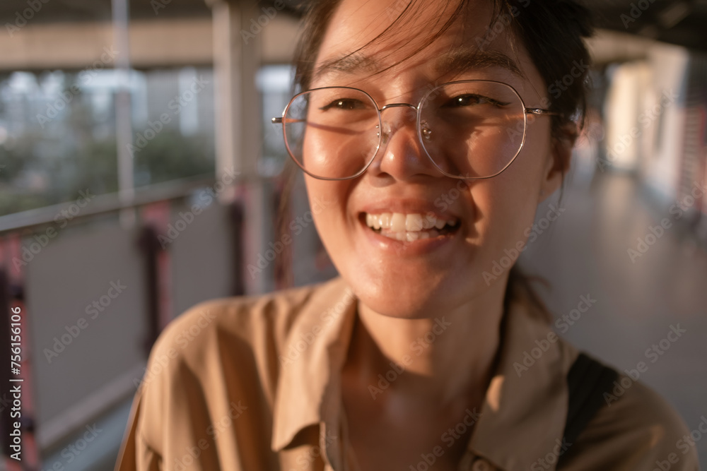 Close up of Asian woman make funny hilarious face to the camera.