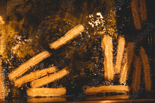 Close up of Mexican Churros dessert  getting cooked