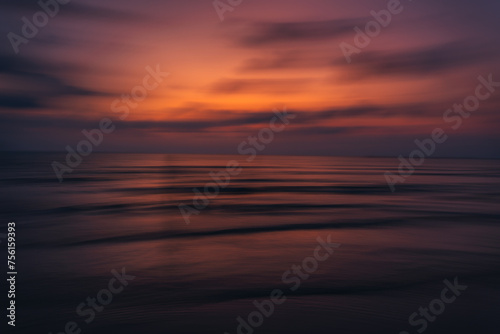 Sunset on the beach Beautiful colors of the sky and sea © artrachen