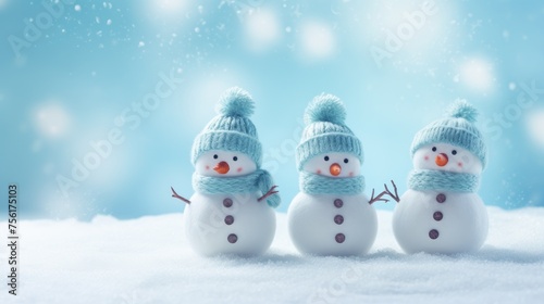Charming knitted snowmen nestled on soft snow against a serene blue backdrop, evoking winter wonder. Ai Generated. © Crazy Juke