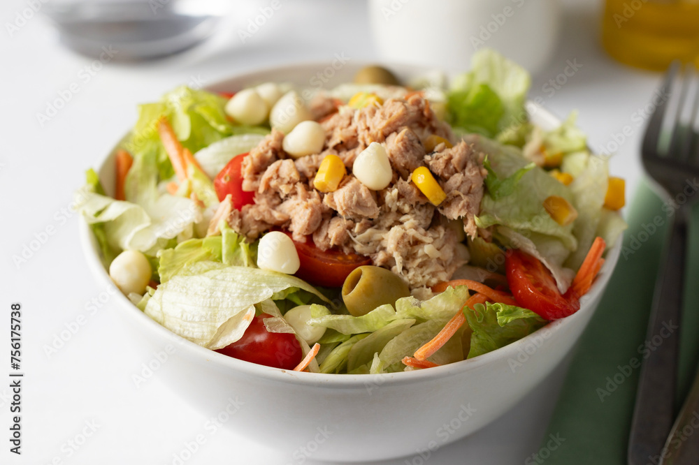 Restaurant menu , Tuna salad bowl with lettuce, tomatoes and other vegetables on white background, Restaurant menu , Tuna salad bowl with lettuce, tomatoes and other vegetables on white background,