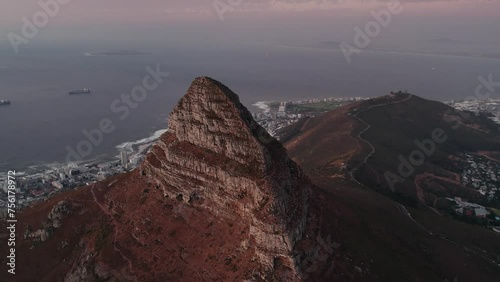 Lion's Head Reveals Signal Hill And Cityscape At Sunset In Cape Town, South Africa. Aerial Drone Shot  photo