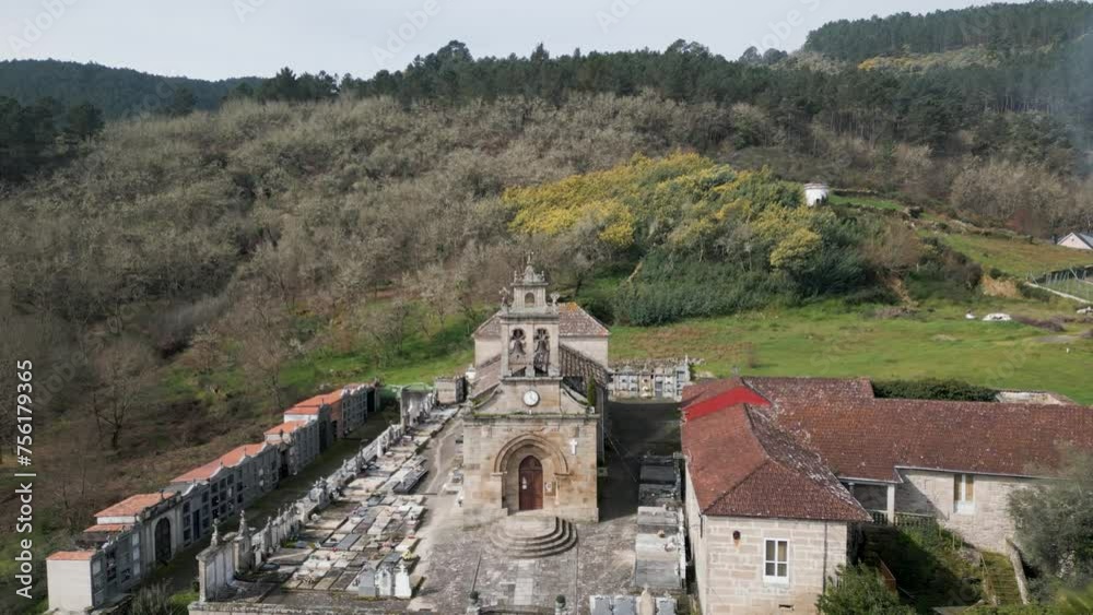 Drone descends to Santa Maria de Punxin in Ourense Galicia Spain front entrance doors and cemetery grounds Drone descends to Santa Maria de Punxin in Ourense Galicia Spain front entrance doors and cemetery grounds
