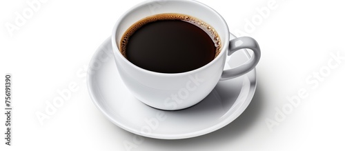 A Kopi tubruk coffee cup on a saucer, placed on a white background. The traditional Java coffee is served in Dishware as a popular drink