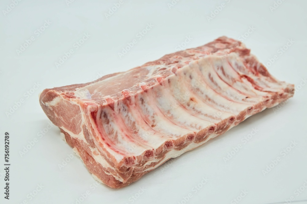 Raw meat on a white background. Pork, beef or lamb. Steak or tenderloin. Different parts of meat products for different dishes.