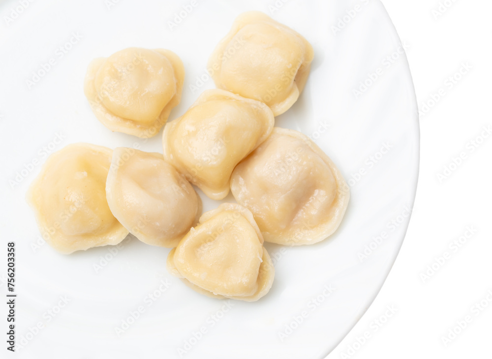 Boiled dumplings in a plate isolated on a white background. View from above