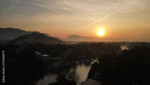 At Kanchanaburi, Thailand. Morning sunrise along the River Khwae Noi. photo