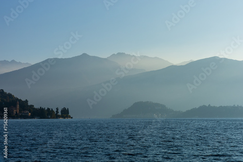 Misty Morning Over Lake Como and Silhouetted Mountains