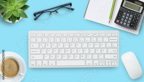 Office desk with stationary on white table background.