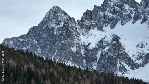 Santa Fosca Civetta resort. Panoramic view of the Dolomites mountains in winter, Italy. Ski resort in Dolomites, Italy. Aerial drone view of Santa Foscaski slopes and mountains in dolomites.	
santa fo photo