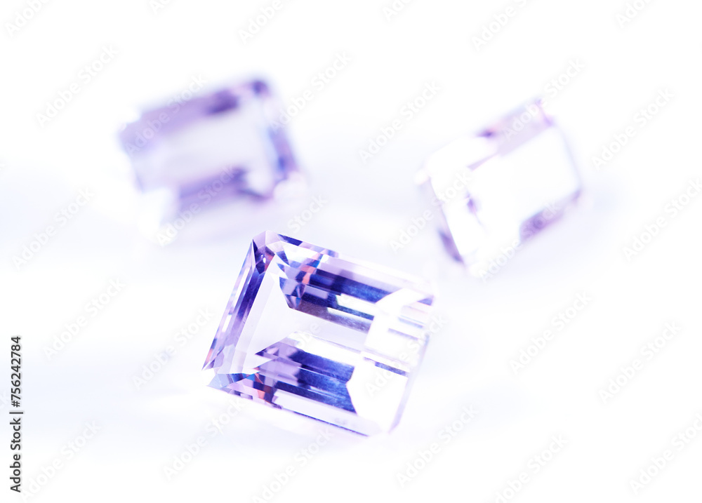 Amethyst, stone or gem in studio by background for natural resource, jewelry and baguette for luxury. Rocks, gemstone or purple crystal in closeup for shine, glow and brilliant with cut for wealth Amethyst, stone or gem in studio by background for natural resource, jewelry and baguette for luxury. Rocks, gemstone or purple crystal in closeup for shine, glow and brilliant with cut for wealth